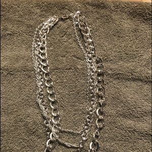 Multi strand silver tone necklace